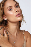 Brinco Trevo Com Pedra Branca